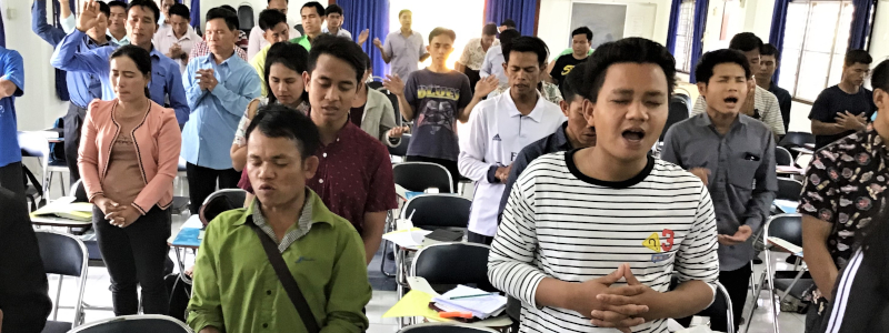 Lao Christians sing praises to God and worship God in their church