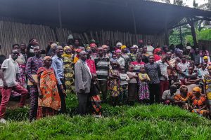 Burundian Christians stand in a group outside of their church