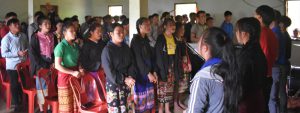 Christian youth and young adults in Laos gather in their local church to sing to God