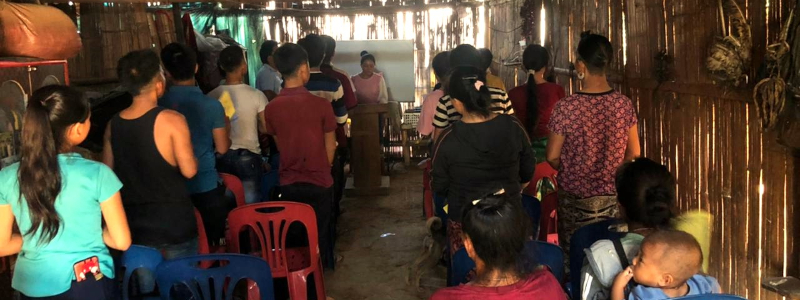 Lao Christians gather in their church building to worship the Lord