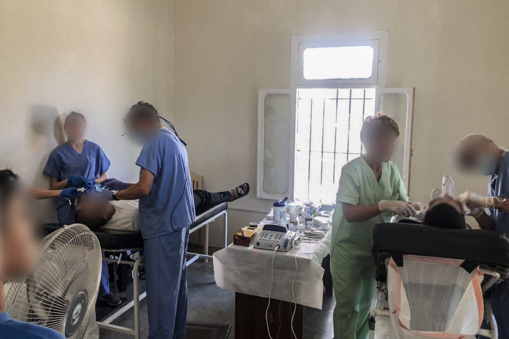 Christian dentists provide dental services to two men in Lebanon