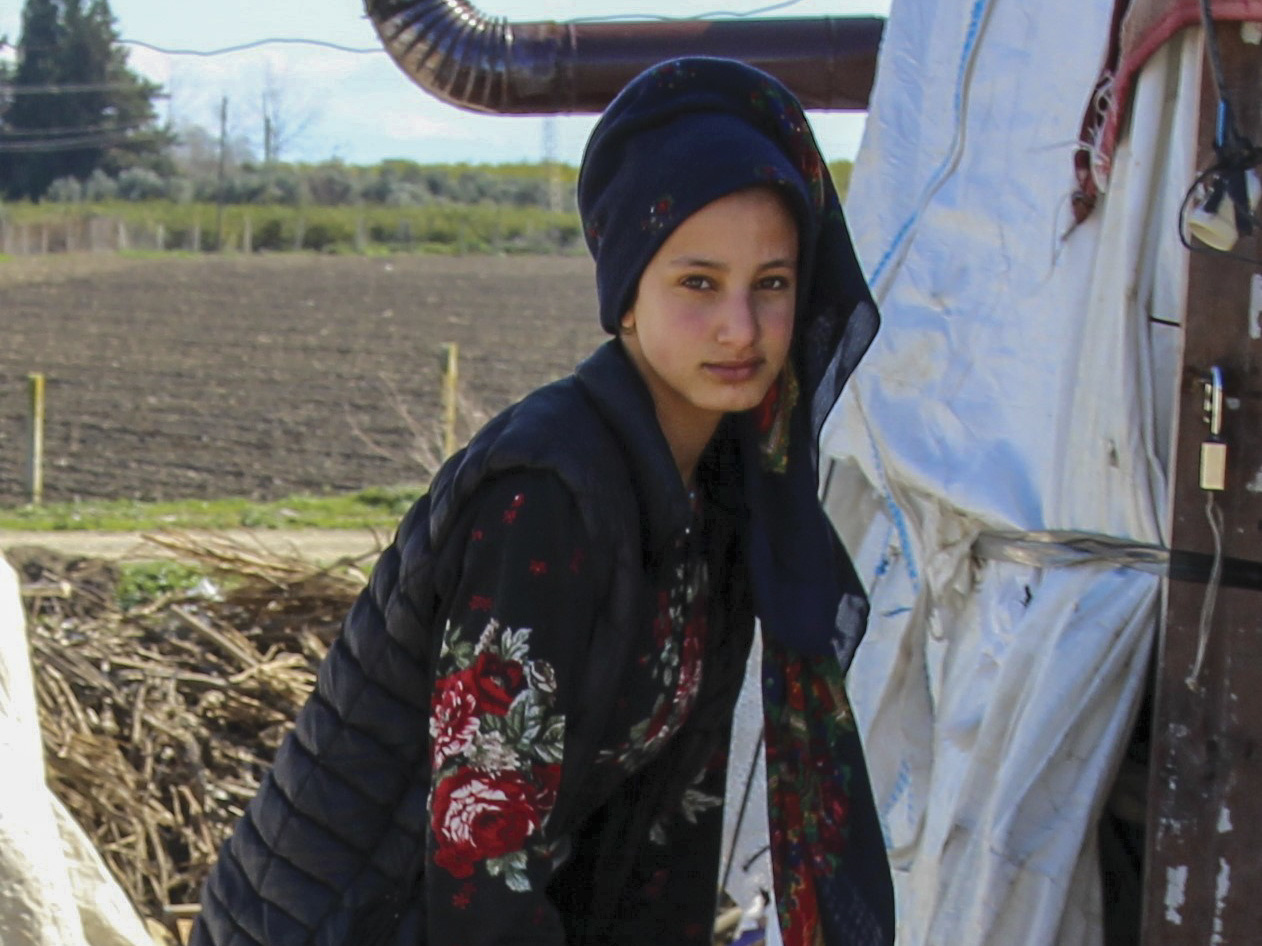 A young Lebanese woman working in a field
